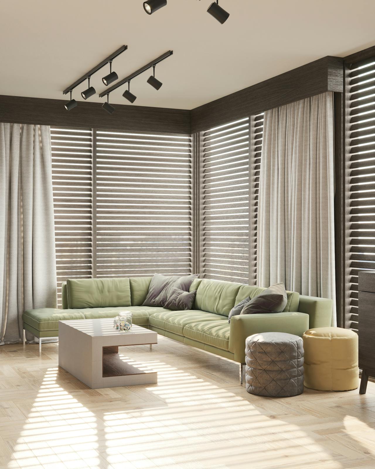 Modern living room with a green couch, a coffee table, and smart blinds for optimal lighting.