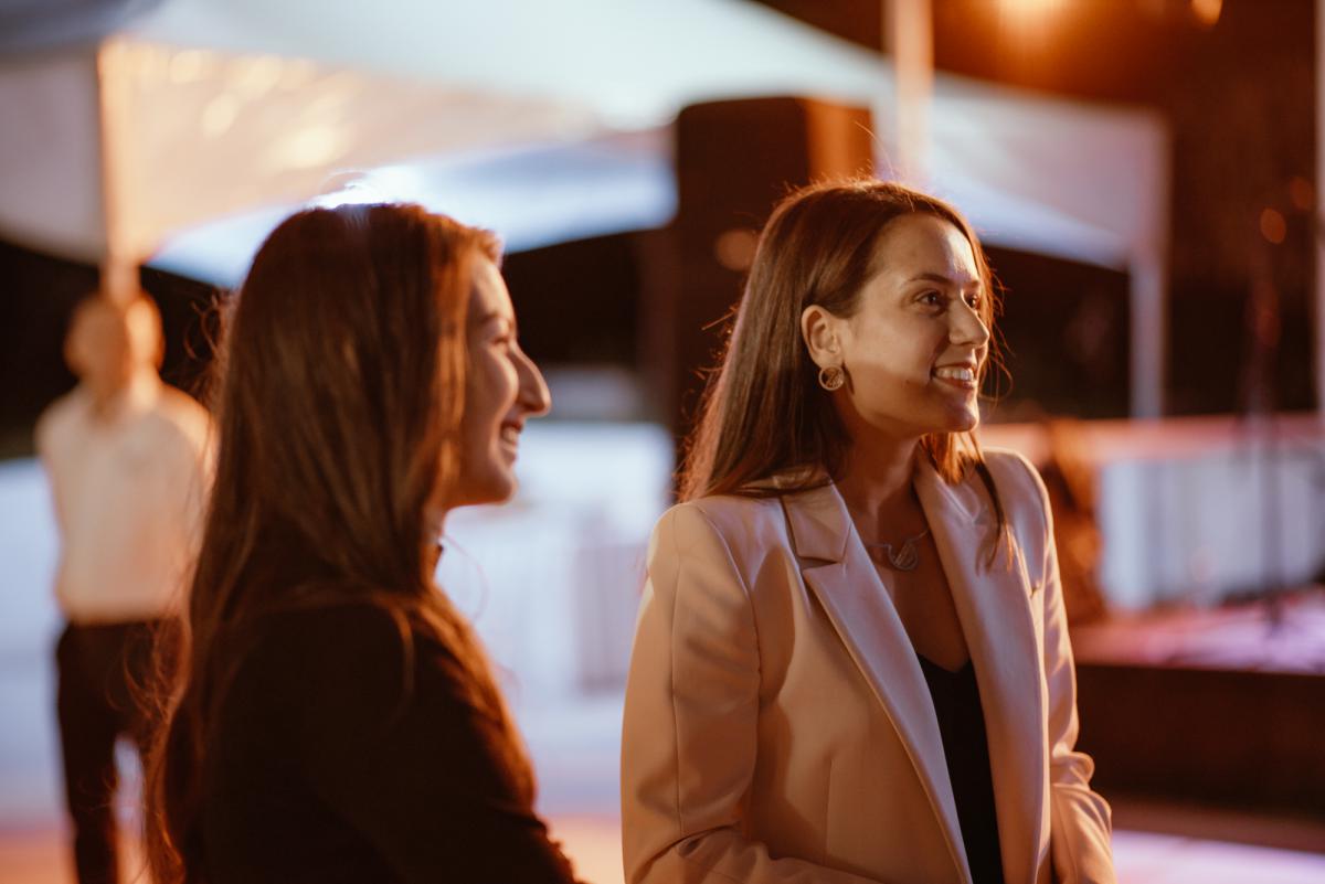 Girls smiling and having fun at a party.