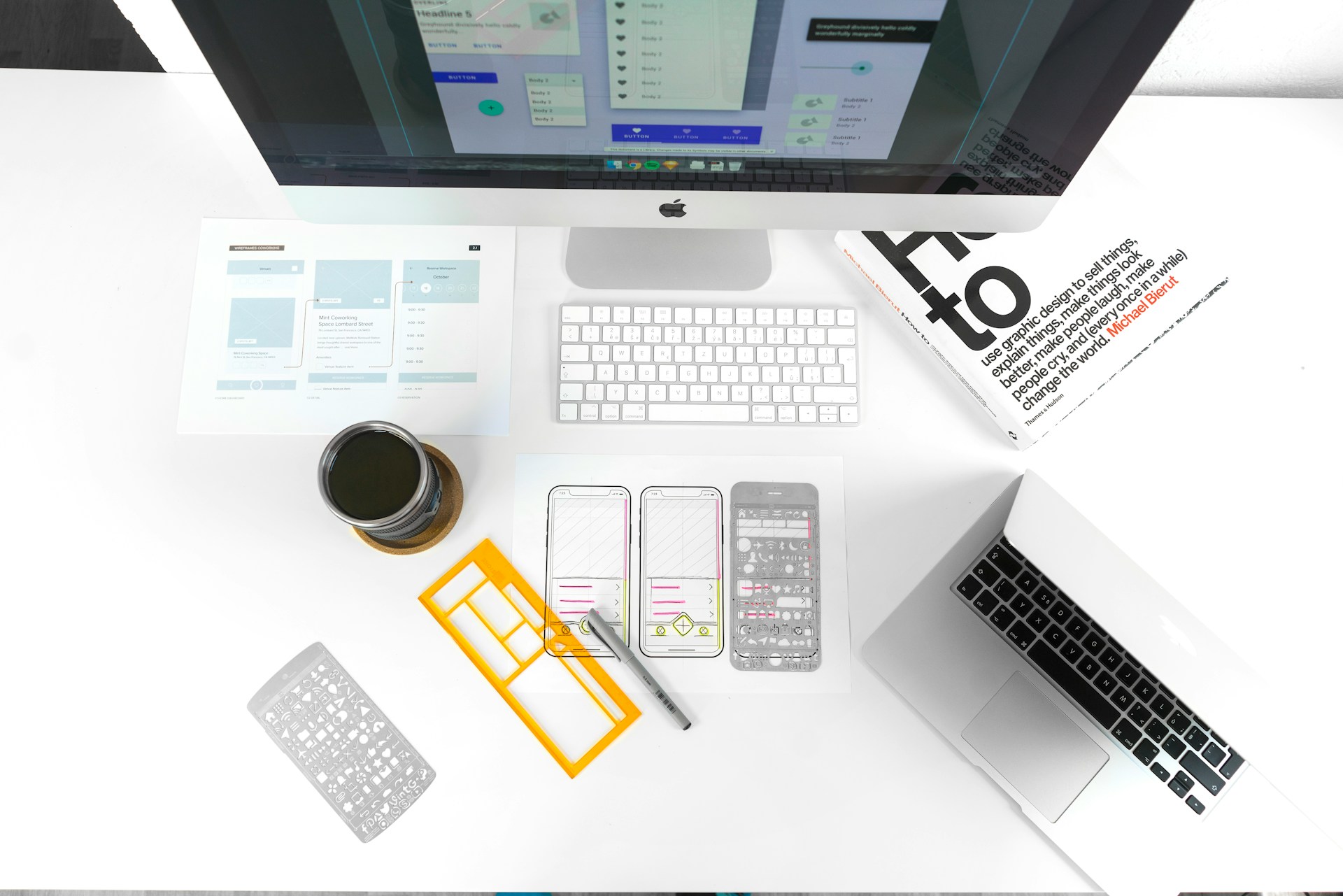 Laptop, monitor, and wireframes.