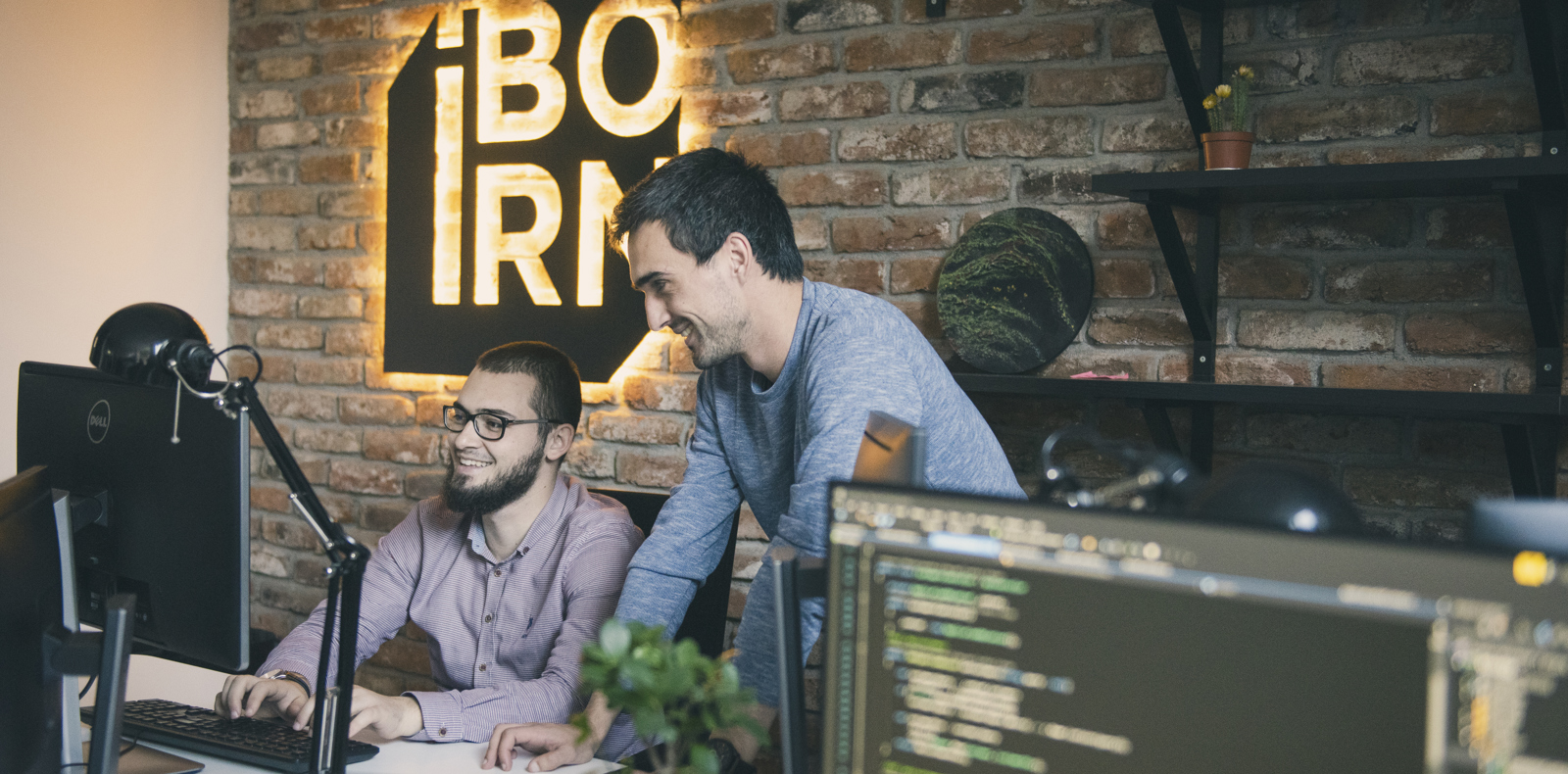 Mobile developers working together in a modern office.