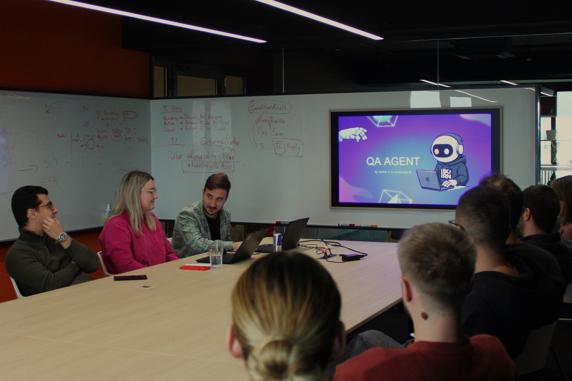 Anastasija and Stefan leading the Lightning Talks on QA Agent