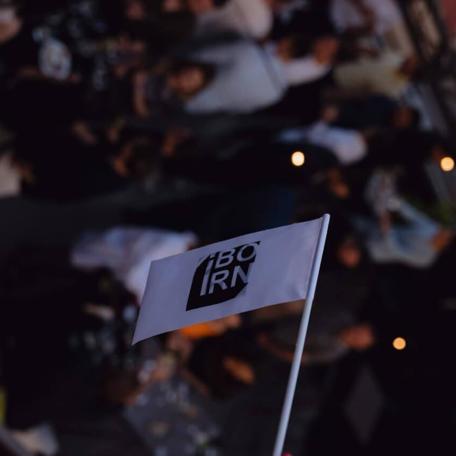 Flag with the IBORN logo on it.