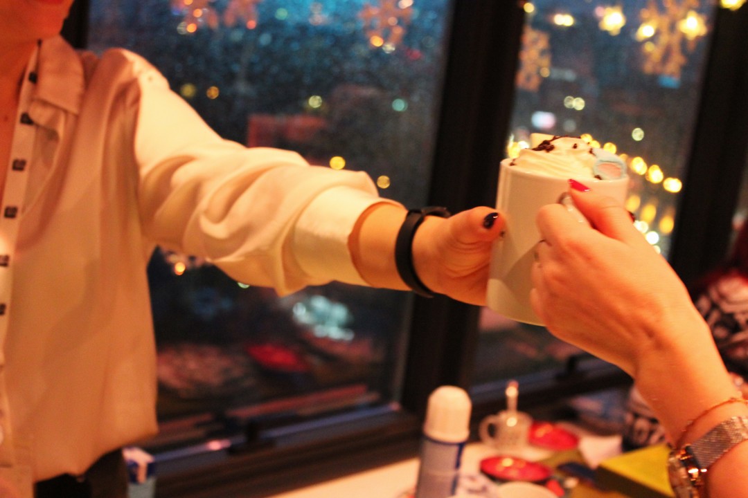 A woman preparing a hot chocolate during the Christmas market celebraiton