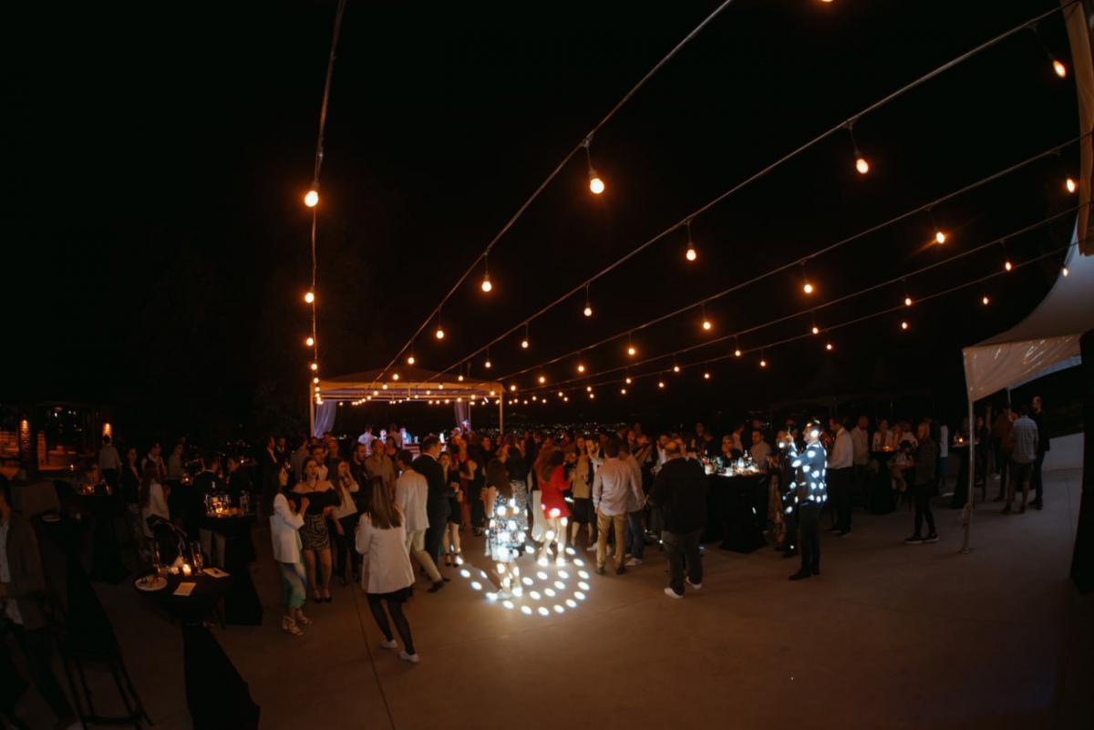 People having fun and dancing at the founding anniversary party.