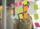 A man looking at sticky notes.